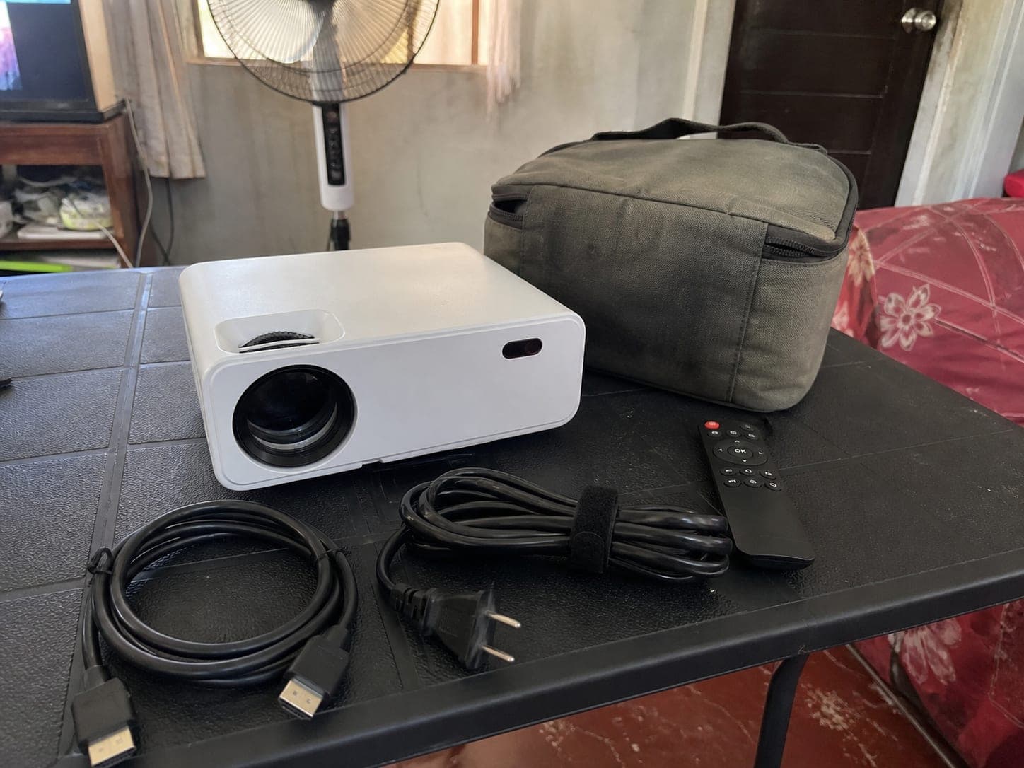 Portable projector with HDMI cable